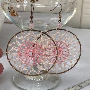 Older pink crochet dream catcher earrings